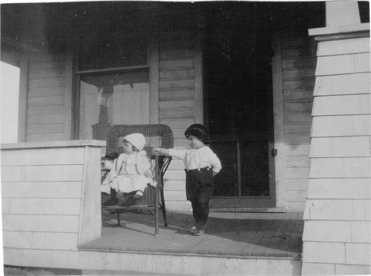 Hubert and Doris Brooks on Porch of Family Home 1